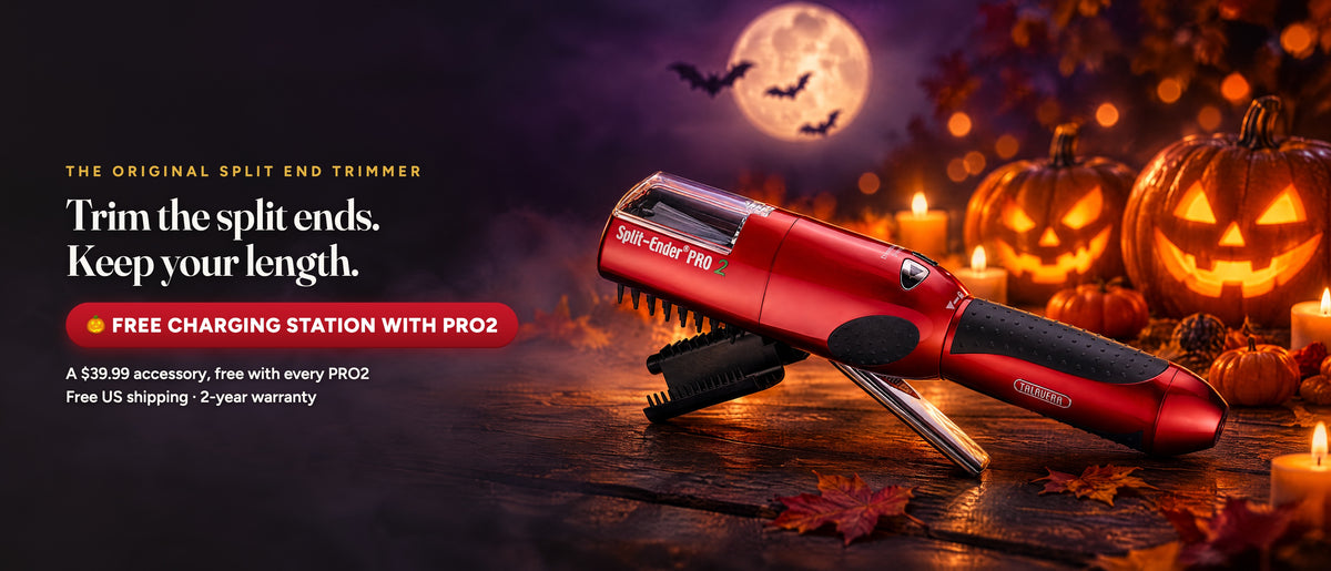 Red Split Ender PRO2 split end trimmer on a Halloween table with glowing jack-o'-lanterns